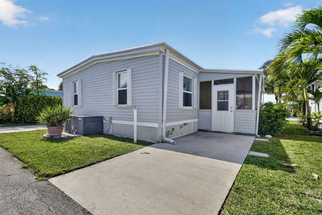 65 Relaxed Circle, Hypoluxo, FL 33462
