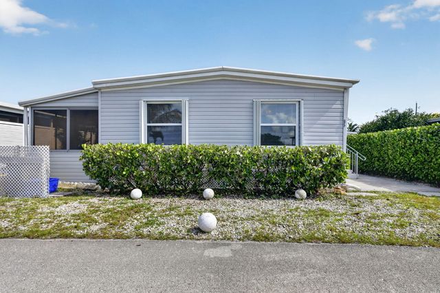 65 Relaxed Circle, Hypoluxo, FL 33462