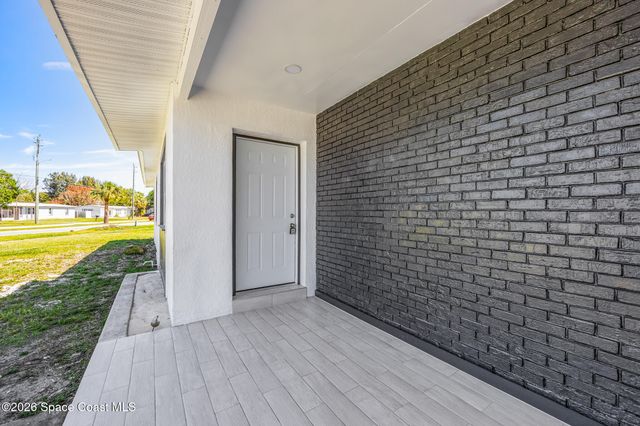 1106 Wild Rose Drive NE, Palm Bay, FL 32905