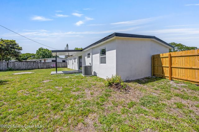 1106 Wild Rose Drive NE, Palm Bay, FL 32905