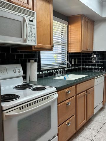 13006 LEVERINGTON STREET, Tampa, FL 33624