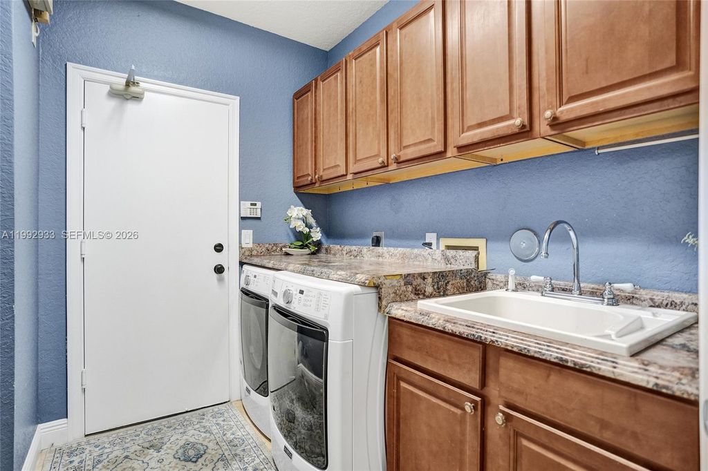 Image 55 of property listing at 14957 SW 34th St, Davie, FL 33331