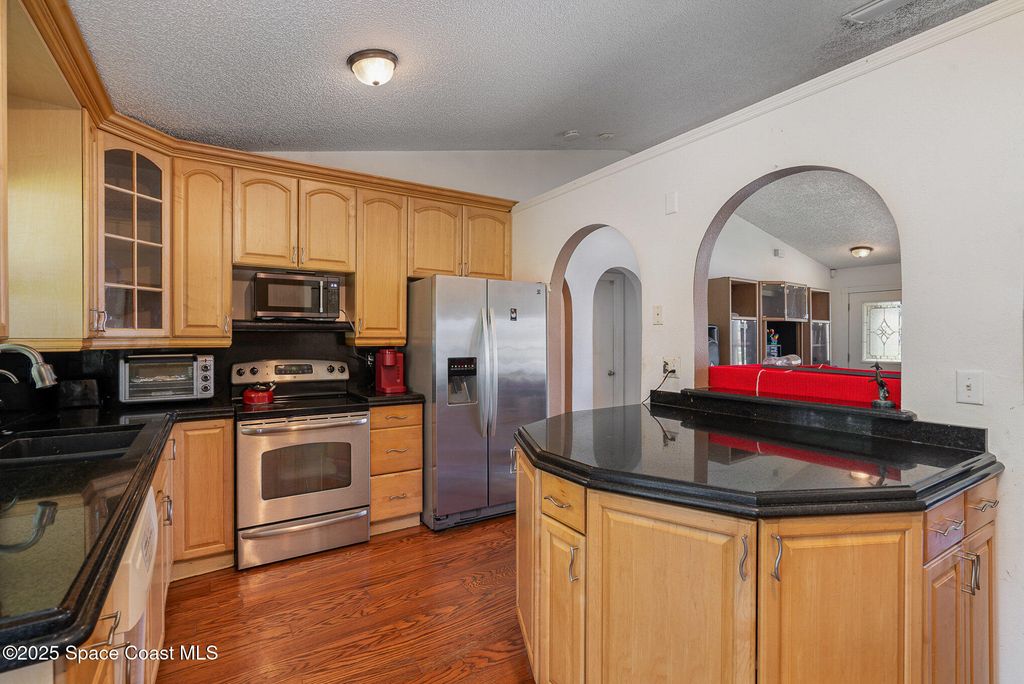Image 14 of property listing at 507 Giovanni Road NW, Palm Bay, FL 32907