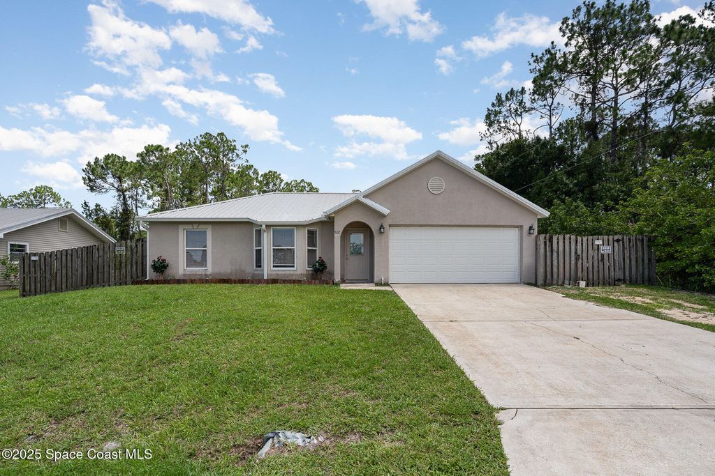 Image 2 of property listing at 507 Giovanni Road NW, Palm Bay, FL 32907