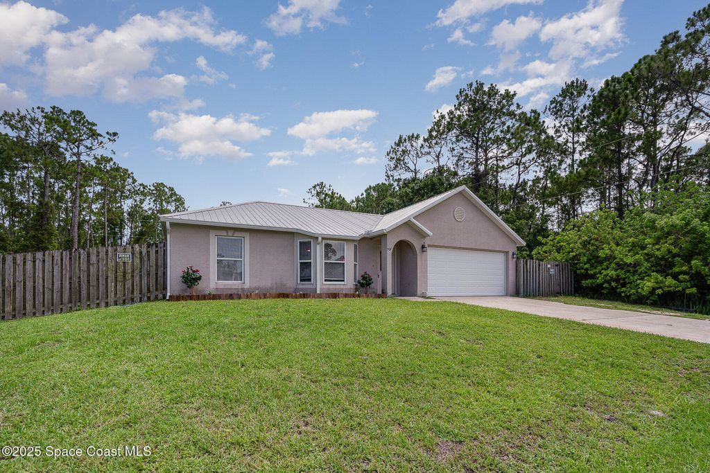 Image 3 of property listing at 507 Giovanni Road NW, Palm Bay, FL 32907