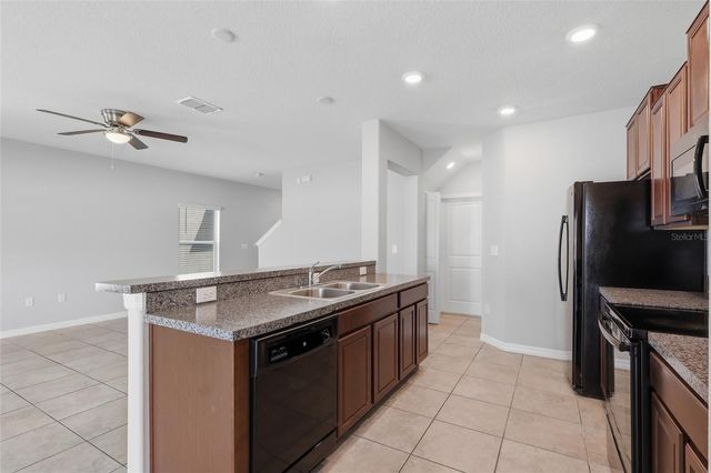 7412 FRENCH MARIGOLD AVENUE, Tampa, FL 33619