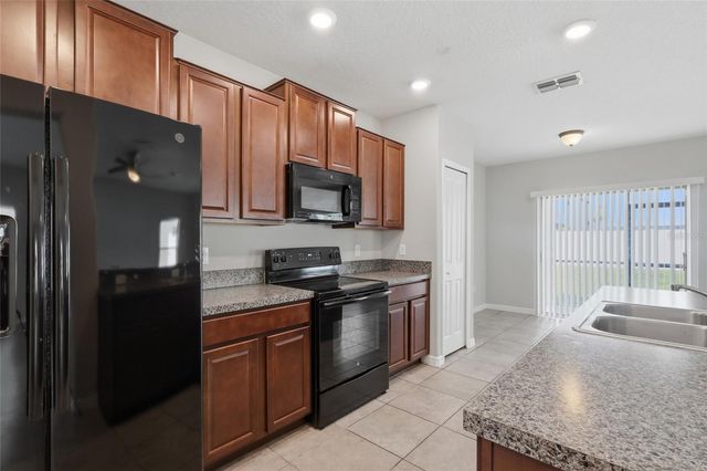 7412 FRENCH MARIGOLD AVENUE, Tampa, FL 33619