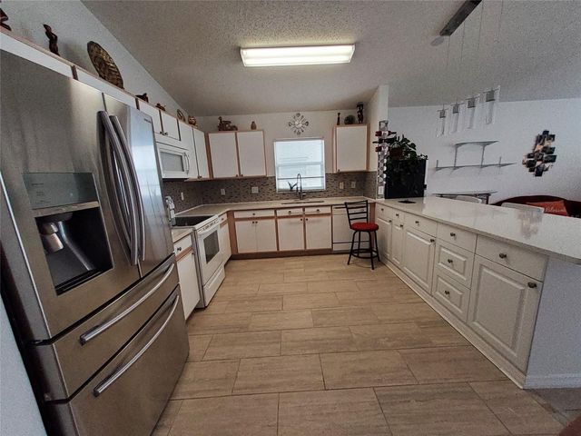 944 LOCKBREEZE DRIVE, Davenport, FL 33897