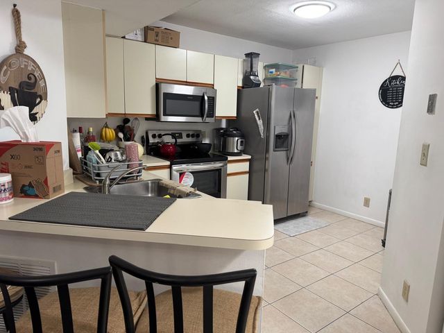8955 Wiles Road 206, Coral Springs, FL 33067