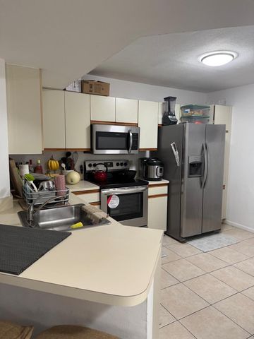 8955 Wiles Road 206, Coral Springs, FL 33067