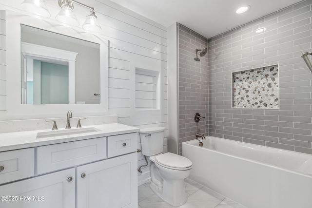 312 NE 58th Street, Oak Island, NC 28465