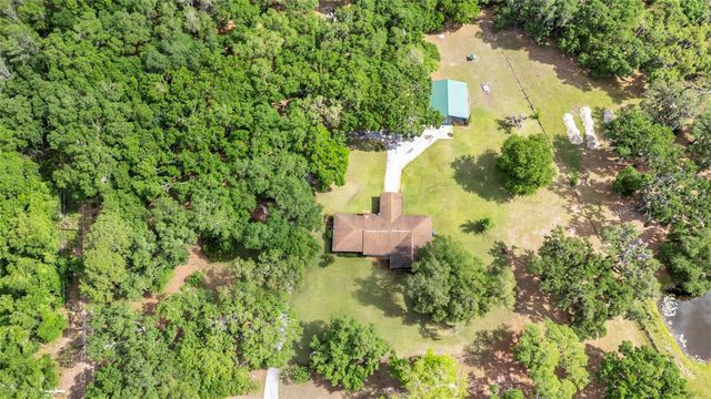 1520 LEGACY WOODS COURT, Groveland, FL 34736