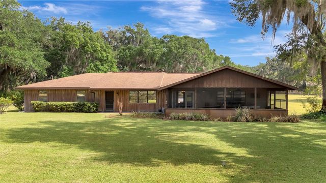 1520 LEGACY WOODS COURT, Groveland, FL 34736