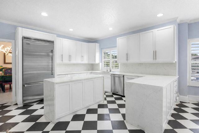 678 Carriage Hill Lane, Boca Raton, FL 33486