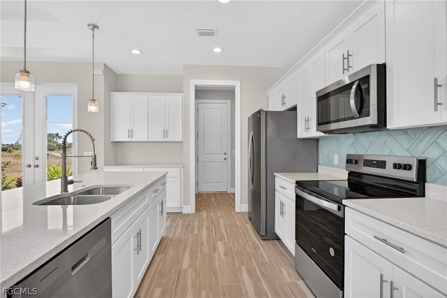 2014 NW 21st AVE, Cape Coral, FL 33993