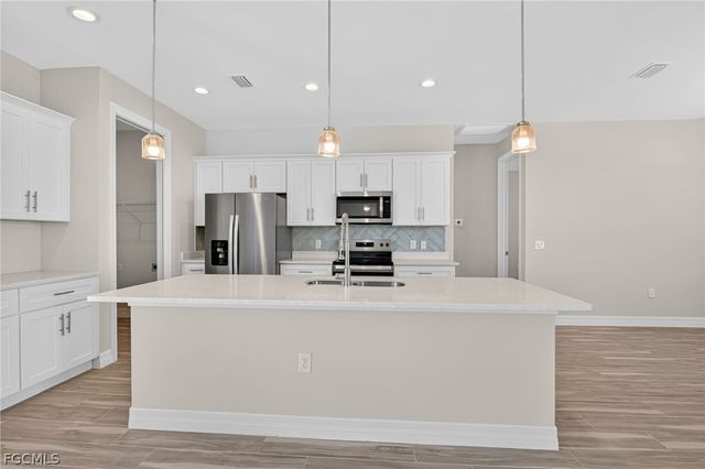 2014 NW 21st AVE, Cape Coral, FL 33993