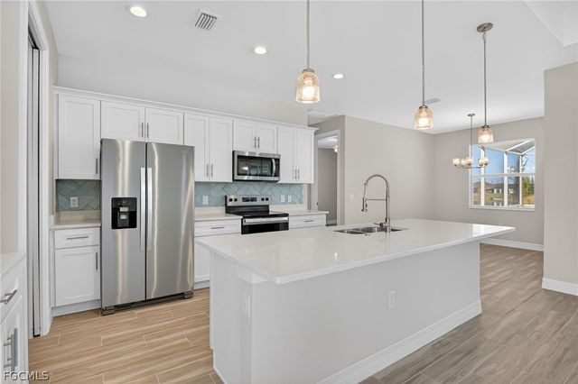 2014 NW 21st AVE, Cape Coral, FL 33993