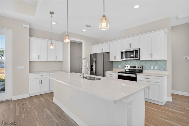 2014 NW 21st AVE, Cape Coral, FL 33993