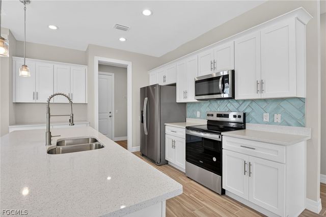 2014 NW 21st AVE, Cape Coral, FL 33993