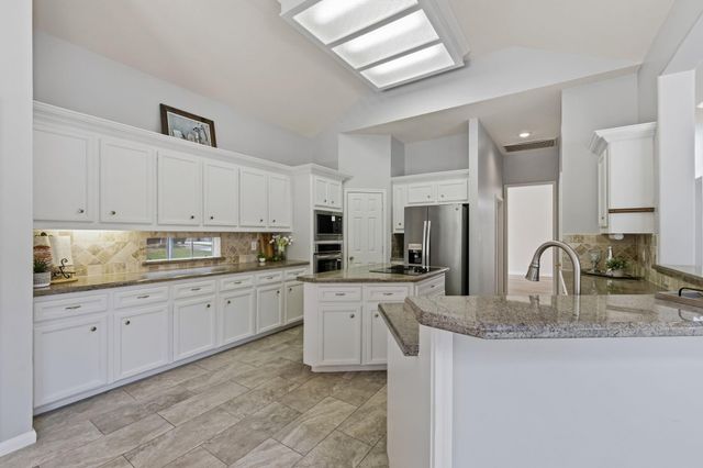 5602 Lofty Magnolia Court, Houston, TX 77345