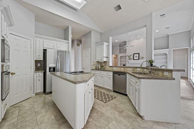 5602 Lofty Magnolia Court, Houston, TX 77345