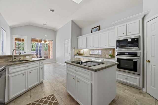 5602 Lofty Magnolia Court, Houston, TX 77345