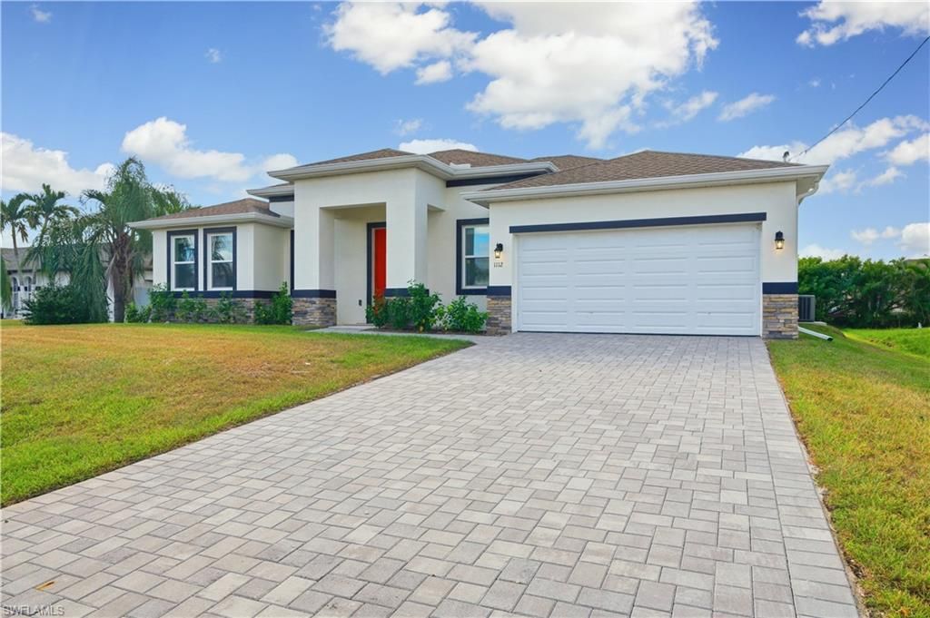 Image 2 of property listing at 1112 NE 19th ST, Cape Coral, FL 33909