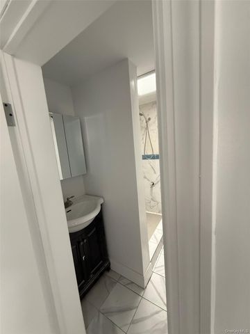 9113 77TH Street, Woodhaven, NY 11421