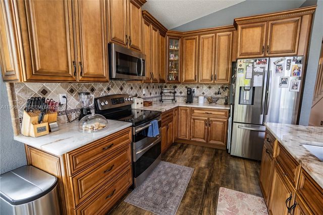 12209 NW 57th St, Coral Springs, FL 33076