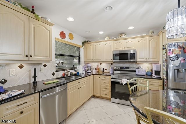 4448 Beechwood Lake DR, Naples, FL 34112