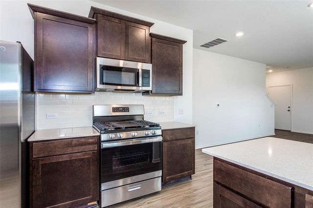 7305 Spotted Leaf WAY, Del Valle, TX 78617