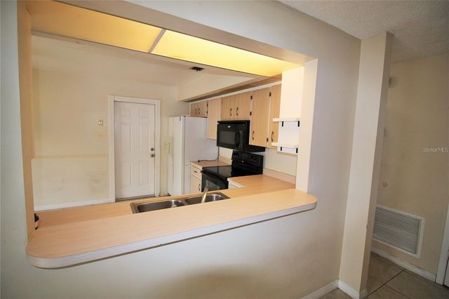 4684 PHEASANT RUN DRIVE 3B, Orlando, FL 32808