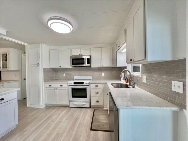 136 ASPEN CIRCLE, Leesburg, FL 34748