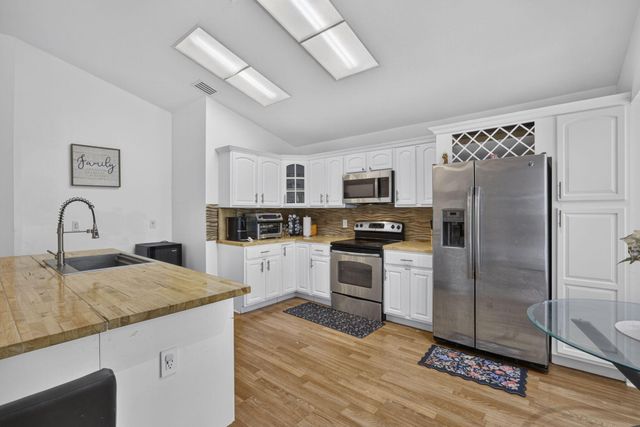 120 Paddock Lane, Greenacres, FL 33413