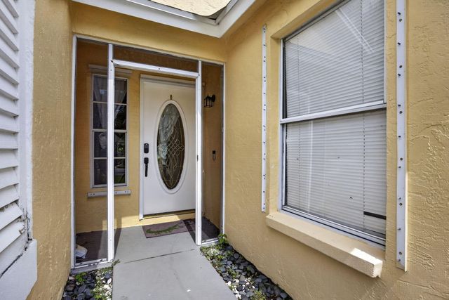 120 Paddock Lane, Greenacres, FL 33413