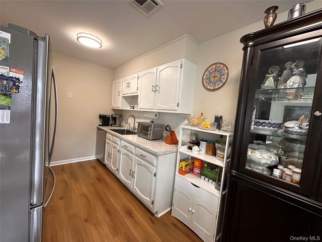 276 Berwick Court A, Ridge, NY 11961