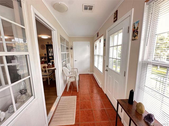 276 Berwick Court A, Ridge, NY 11961