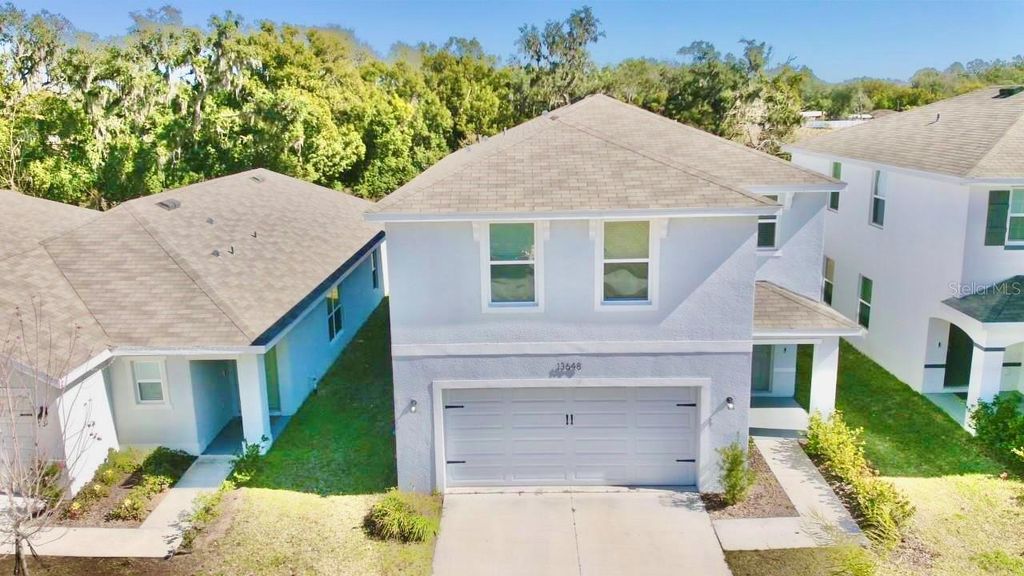 Image 1 of property listing at 13648 WHISKEY DAISY DRIVE, Dade City, FL 33525