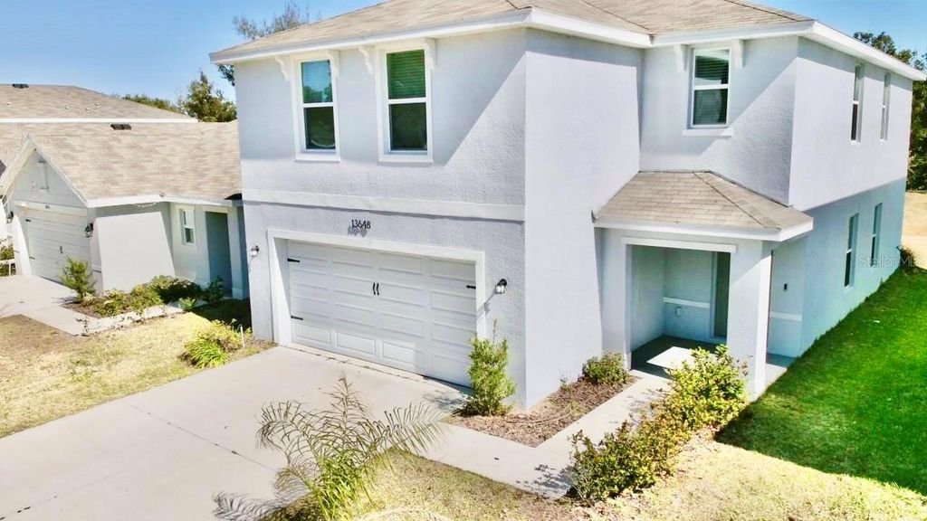 Image 2 of property listing at 13648 WHISKEY DAISY DRIVE, Dade City, FL 33525