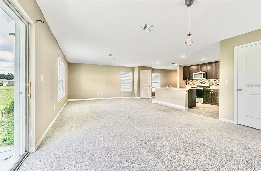 Image 12 of property listing at 13648 WHISKEY DAISY DRIVE, Dade City, FL 33525