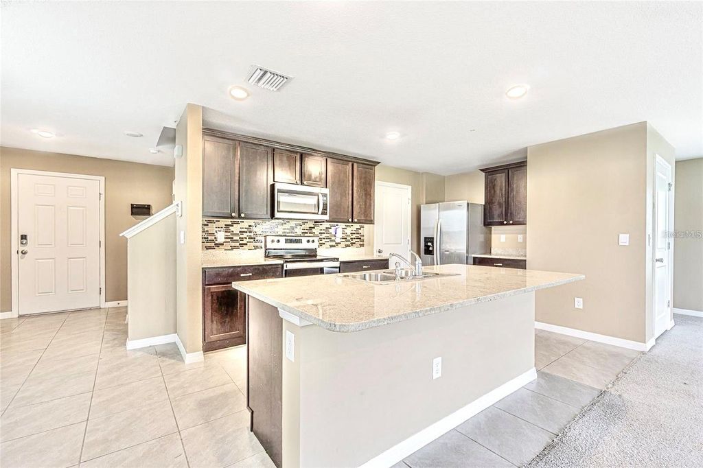 Image 7 of property listing at 13648 WHISKEY DAISY DRIVE, Dade City, FL 33525