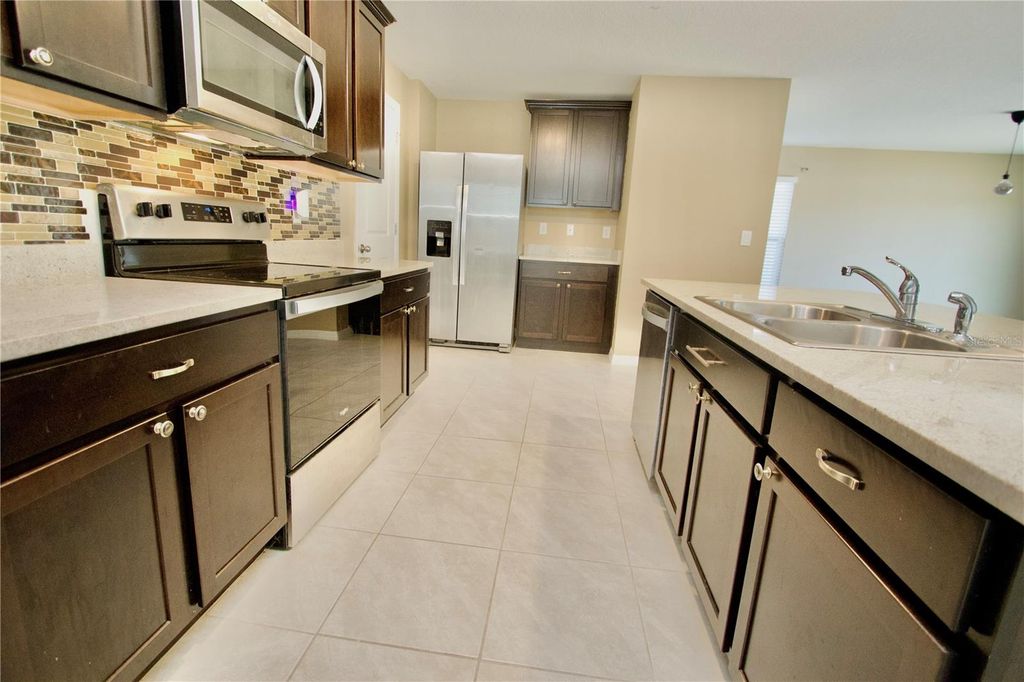 Image 9 of property listing at 13648 WHISKEY DAISY DRIVE, Dade City, FL 33525