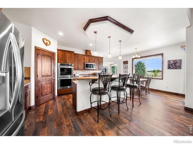 8213 Cherry Blossom Drive, Windsor, CO 80550