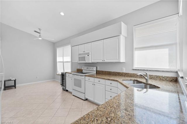 1717 Winding Oaks WAY, Naples, FL 34109
