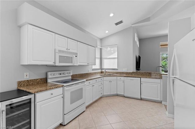 1717 Winding Oaks WAY, Naples, FL 34109