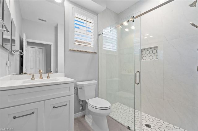 1717 Winding Oaks WAY, Naples, FL 34109