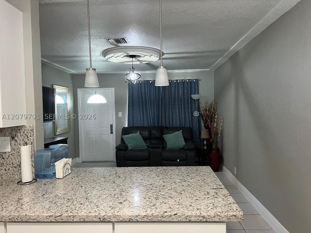 337 Phippen Waiters Rd, Dania Beach, FL 33004