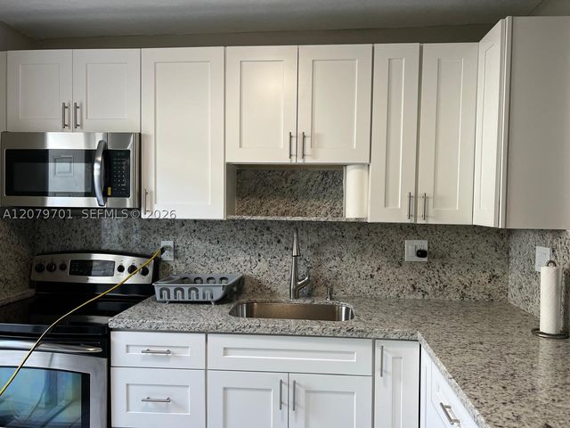 337 Phippen Waiters Rd, Dania Beach, FL 33004
