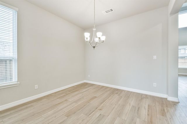 8211 Chartres Wind Drive, Magnolia, TX 77354