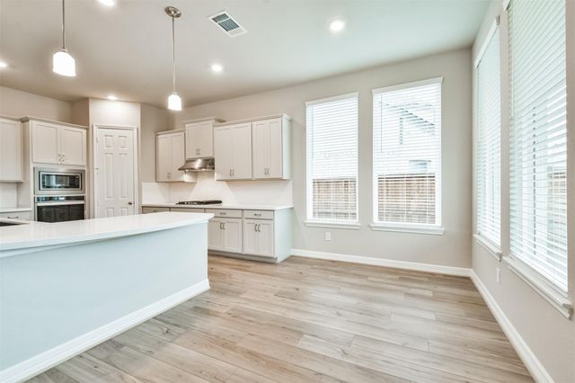 8211 Chartres Wind Drive, Magnolia, TX 77354